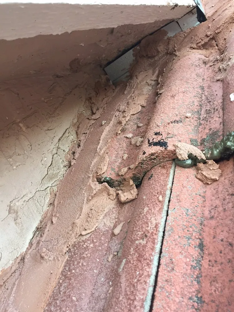 Slide of Arias Roofing