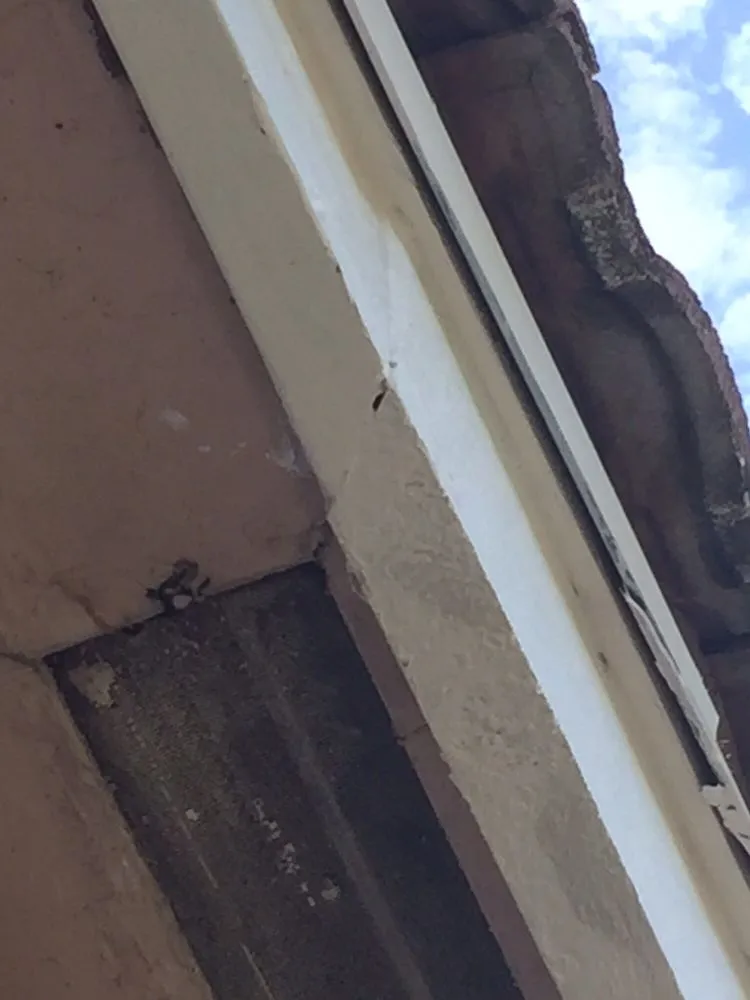 Slide of Arias Roofing