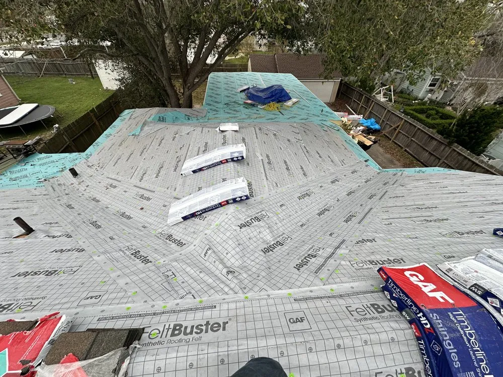 Slide of Aris Roofing and Construction