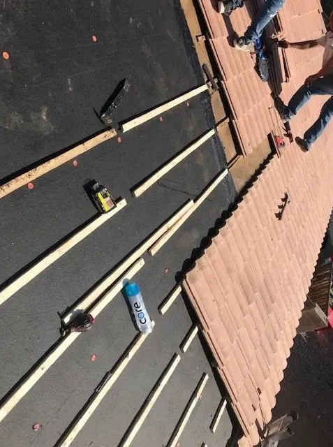 Slide of Arizona Roof Busters