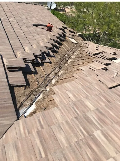 Slide of Arizona Roof Busters