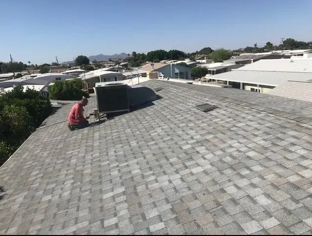 Slide of Arizona Roof Busters