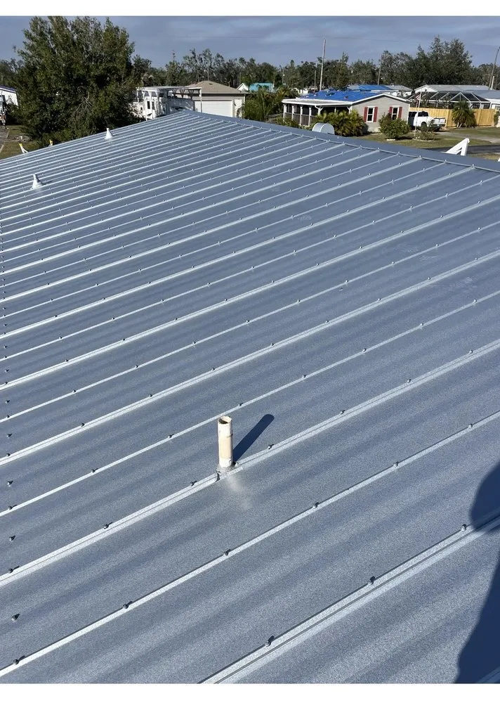 Slide of Ark Roofing and solar