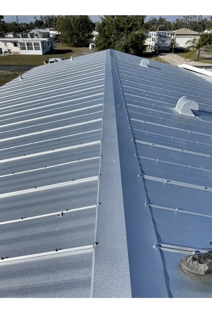 Slide of Ark Roofing and solar