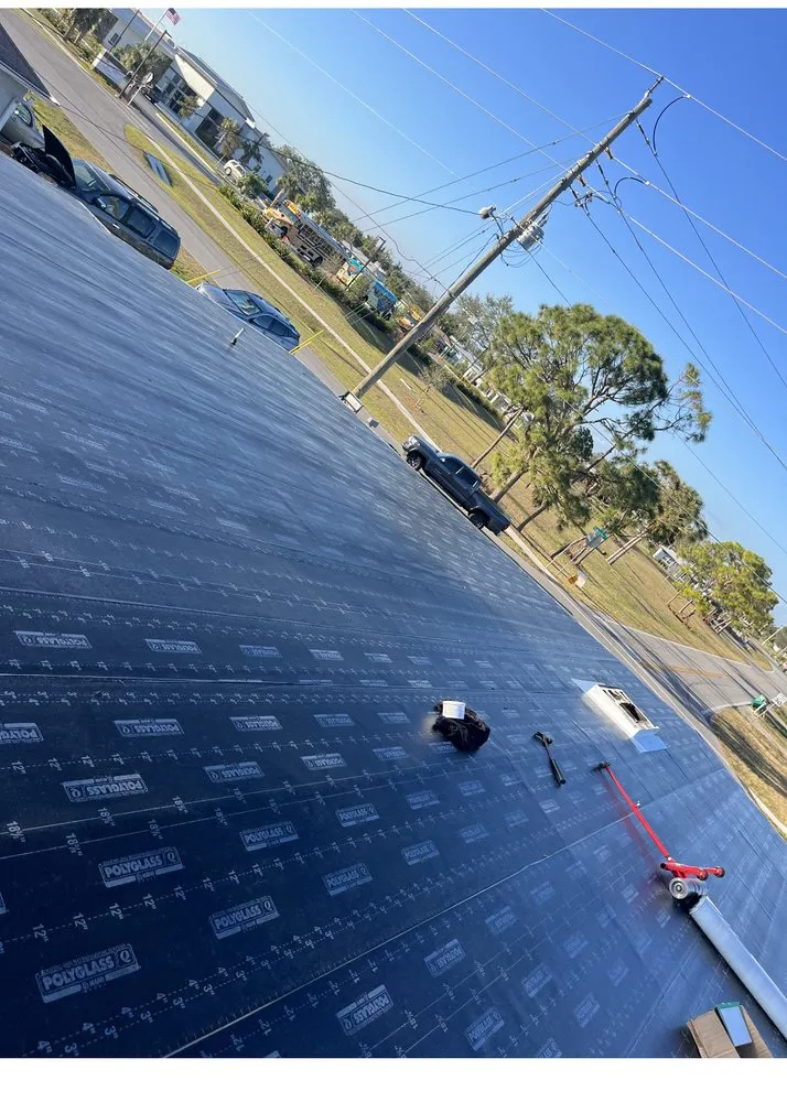 Slide of Ark Roofing and solar