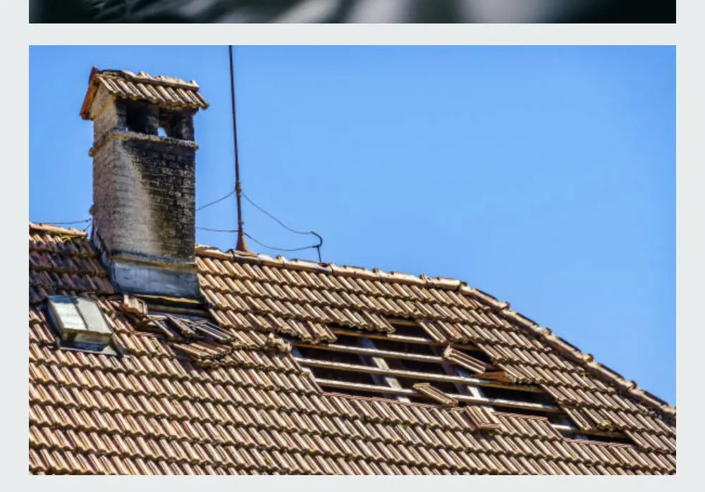 Slide of ARK Roofing