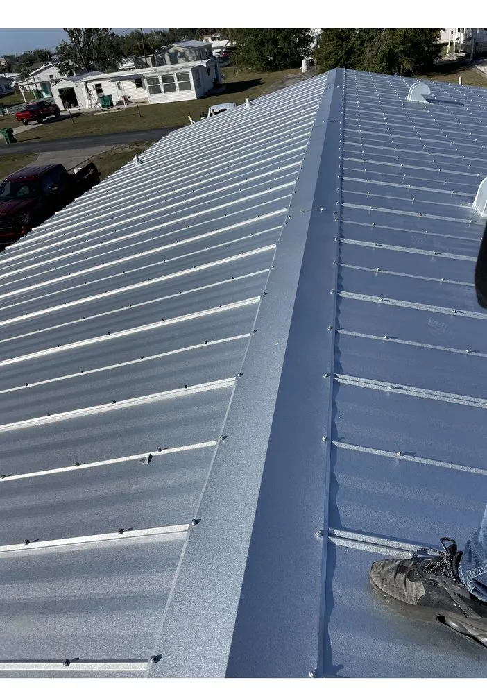 Slide of ARK Roofing