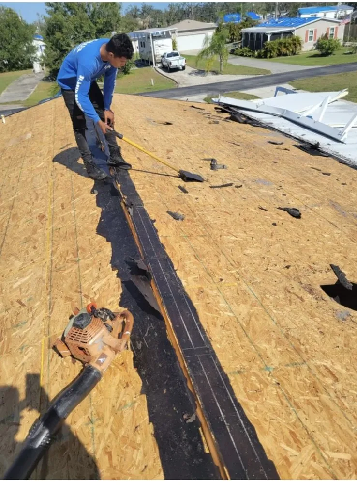 Slide of ARK Roofing