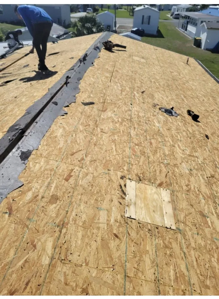 Slide of ARK Roofing