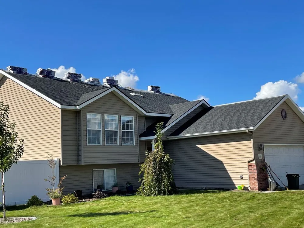 Slide of ARK Roofing