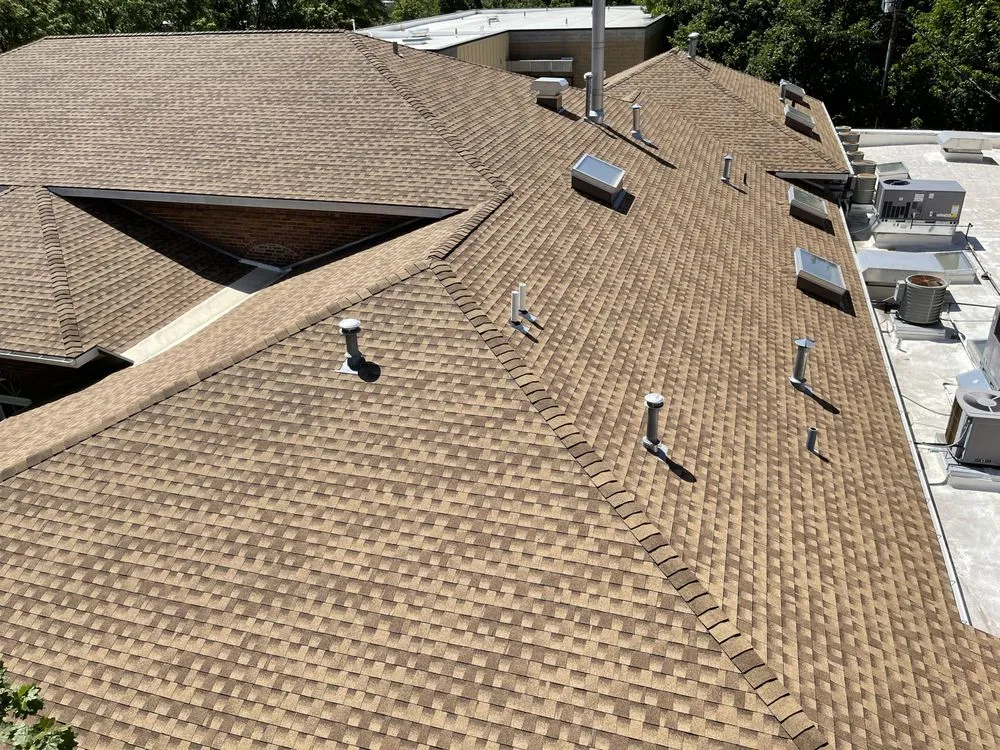 Slide of ARK Roofing