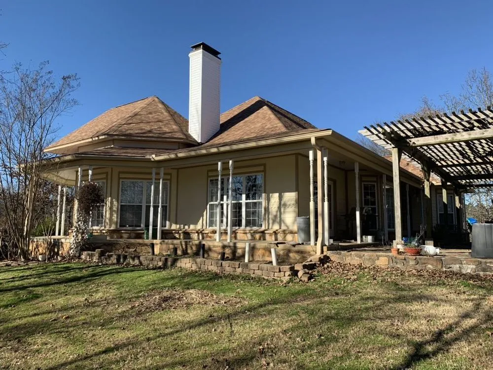 Slide of Arkansas Roofing Kompany