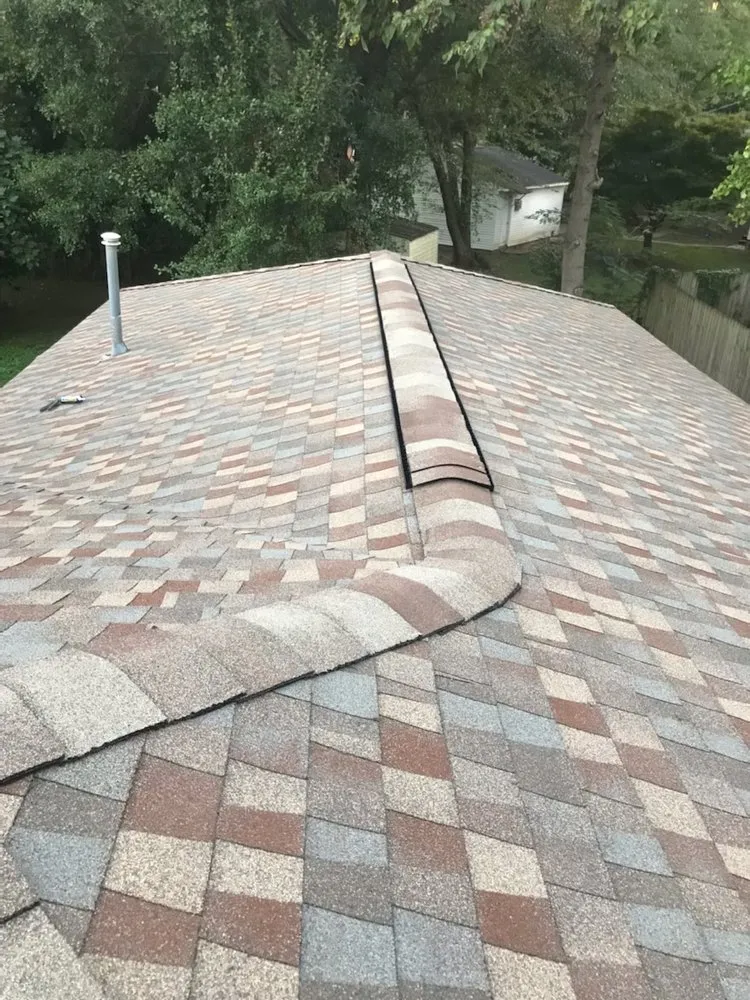 Slide of Arkbow Roofing