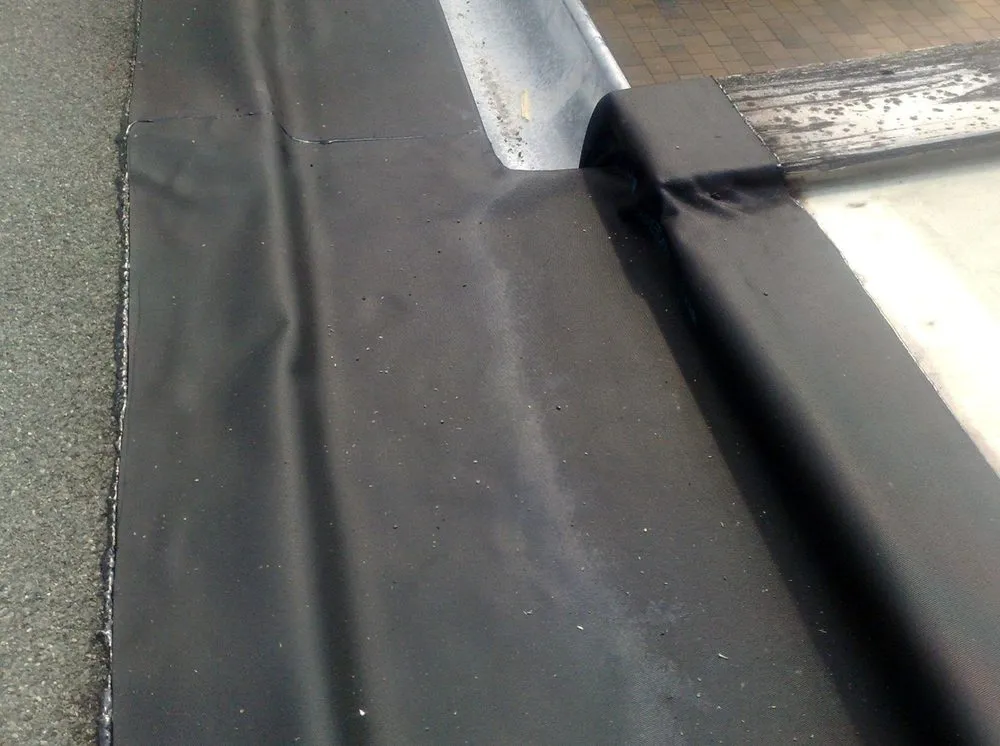 Slide of Arlanza Roofing