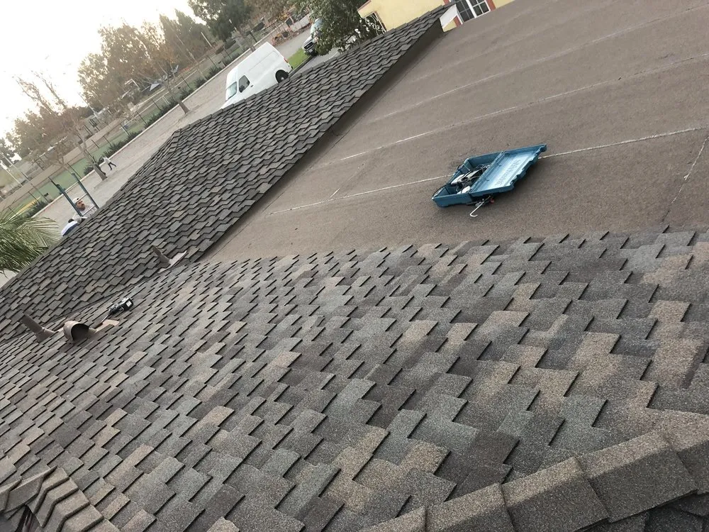 Slide of ARM Roofing Specialists