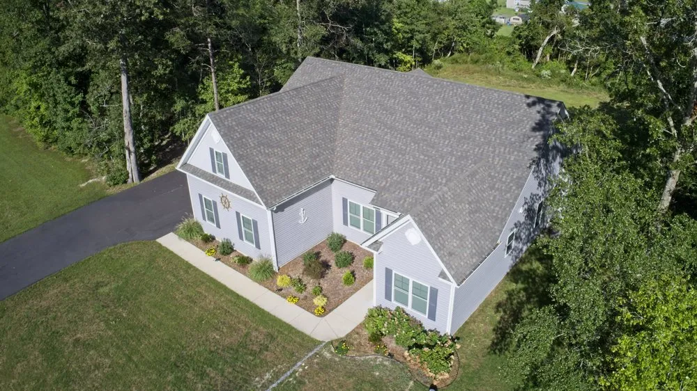 Slide of Arma Roofing