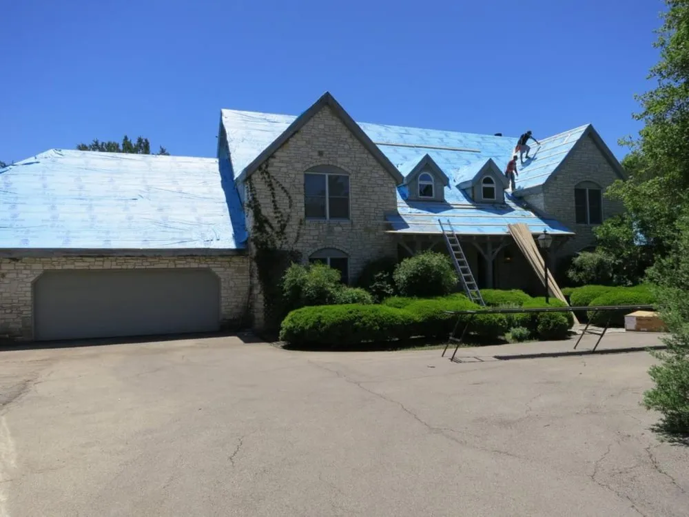 Slide of Armadillo Roofing & Exteriors