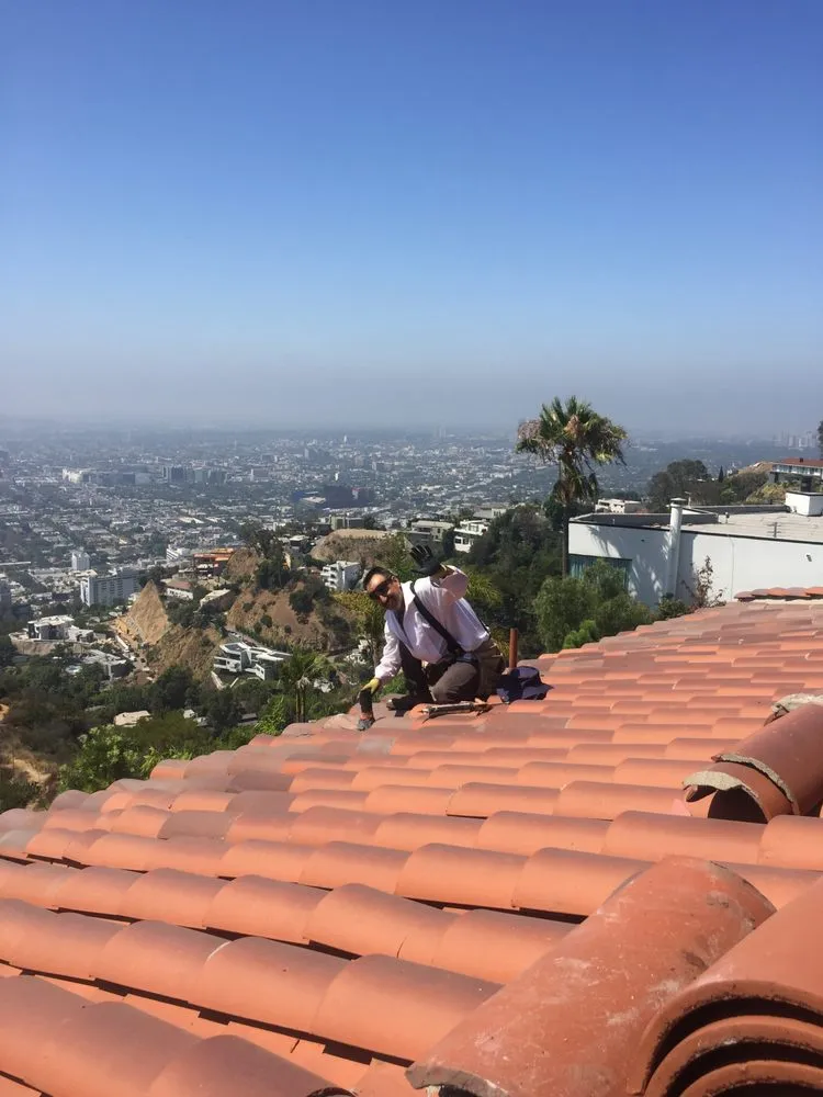 Slide of Armandos Roofing