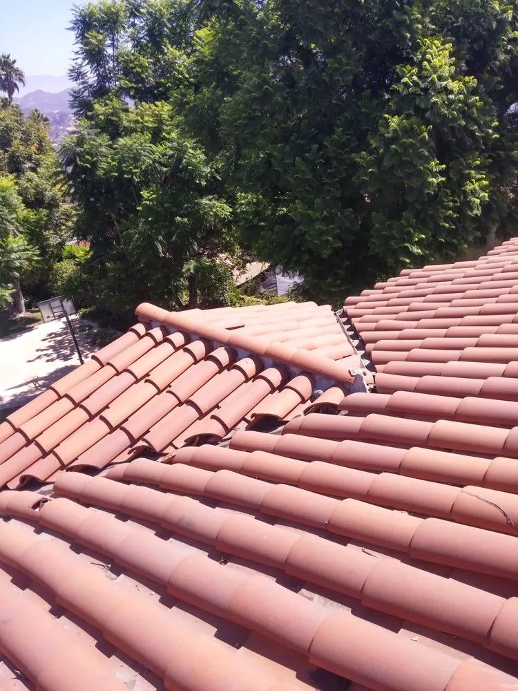 Slide of Armandos Roofing