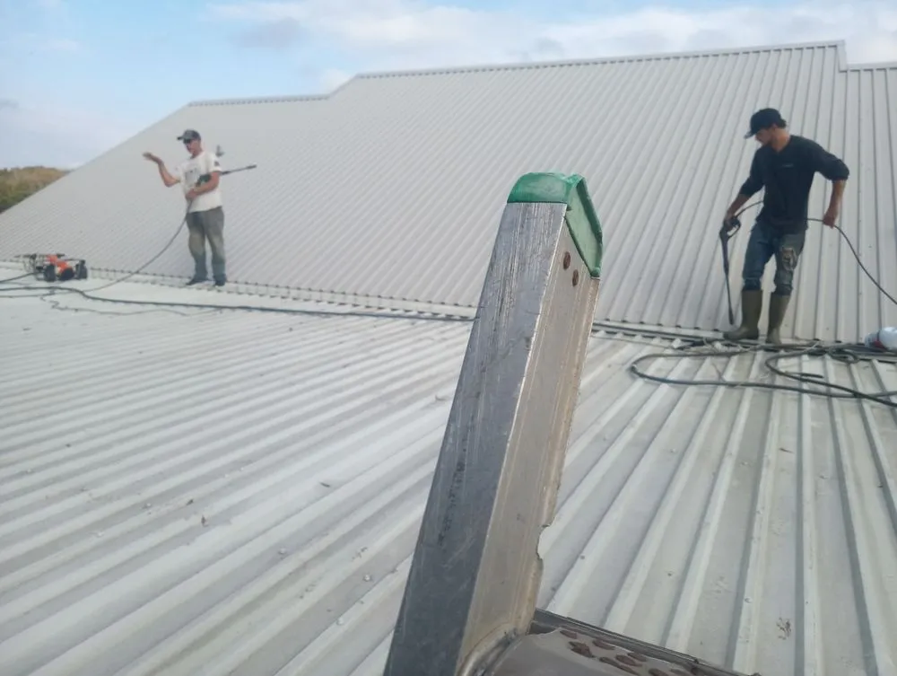 Slide of Armands Roofing