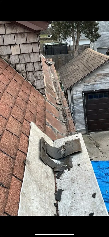 Slide of Armored Roofing & Construction