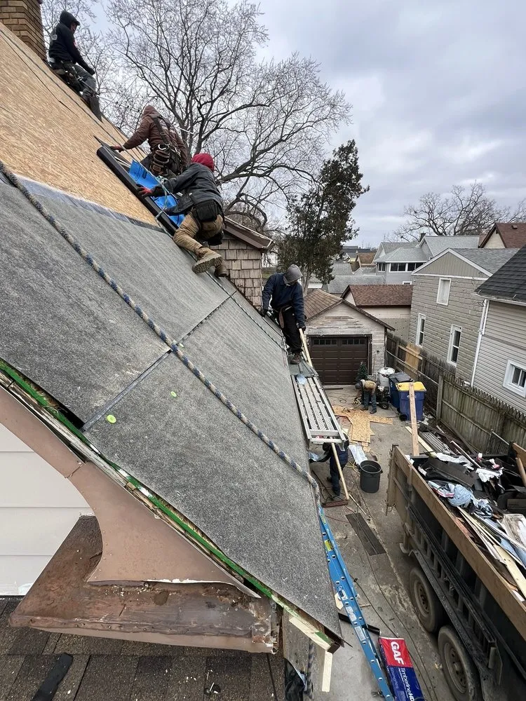 Slide of Armored Roofing & Construction