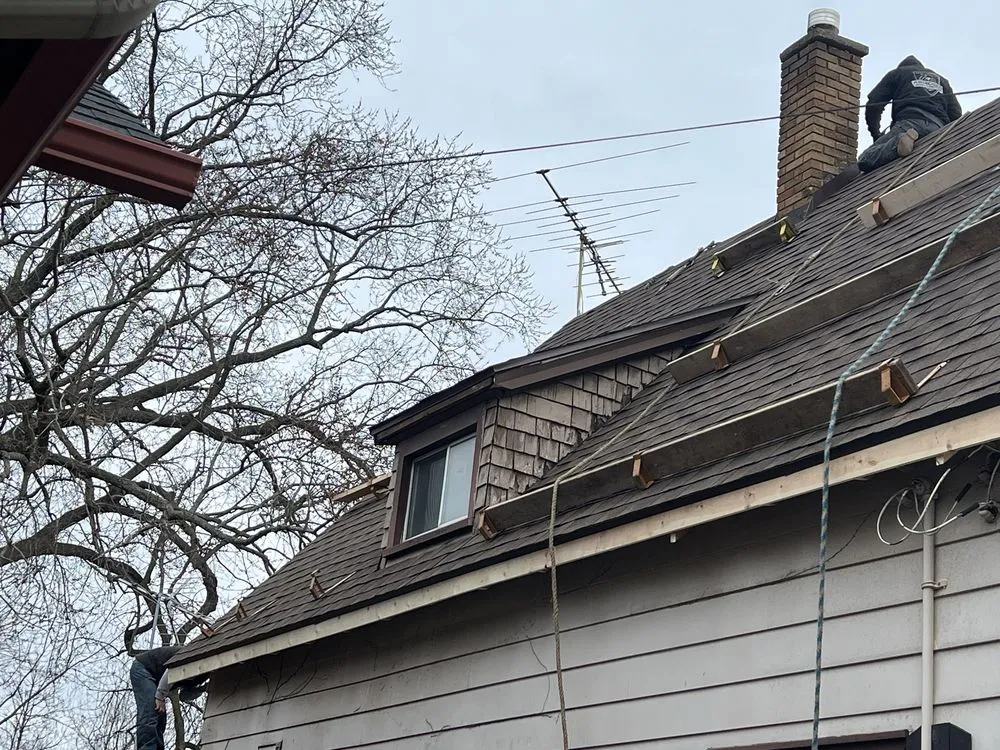 Slide of Armored Roofing & Construction