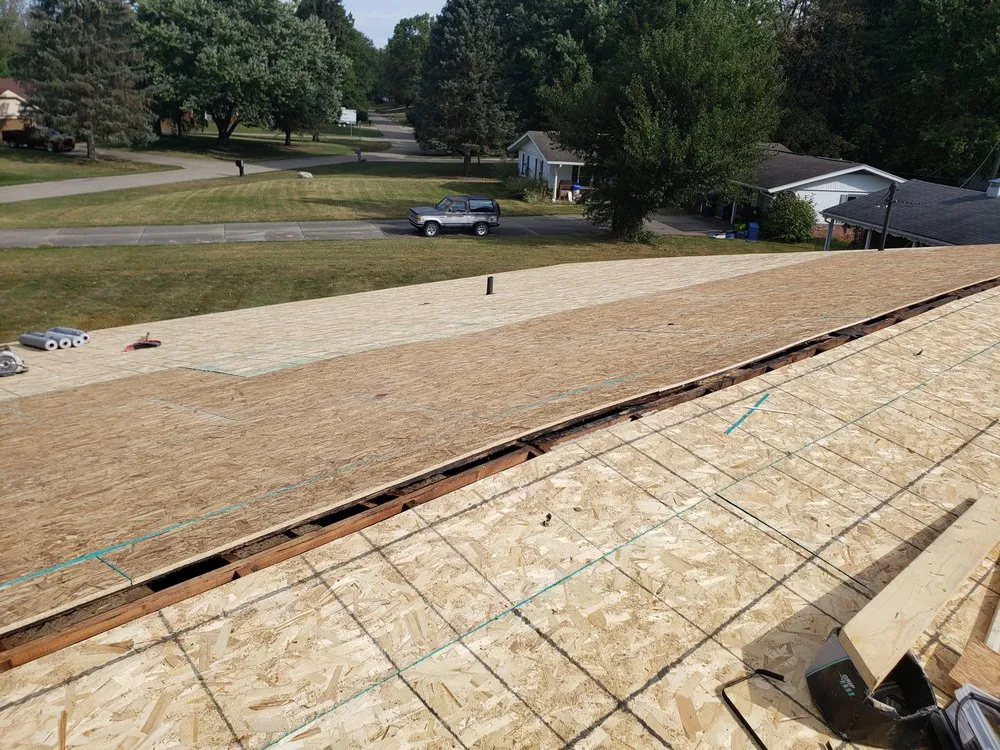 Slide of Armour Roofing and Construction