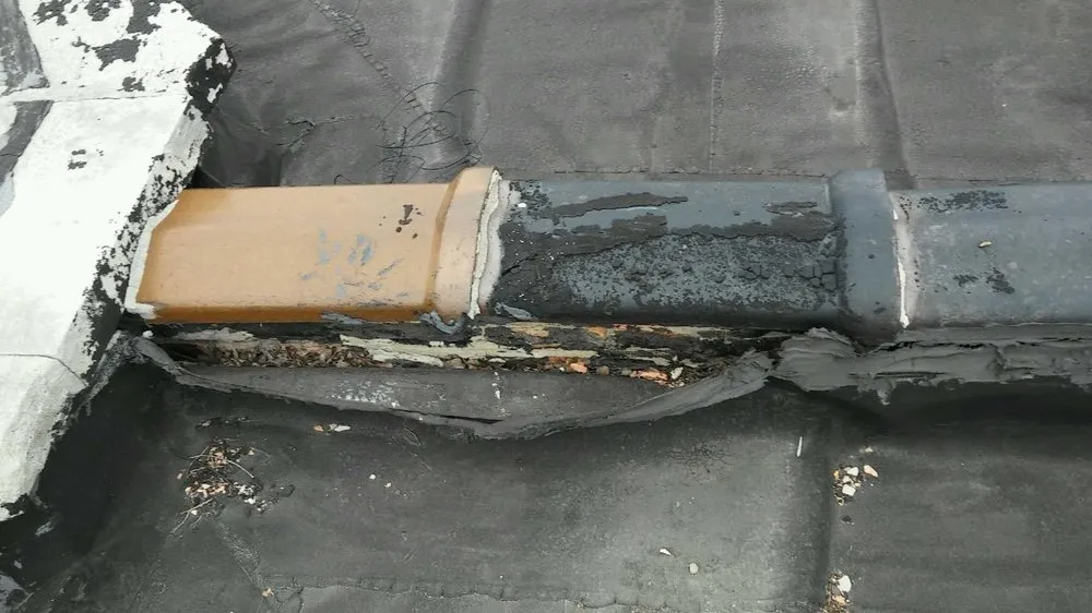 Slide of Armour Roofing Masonry