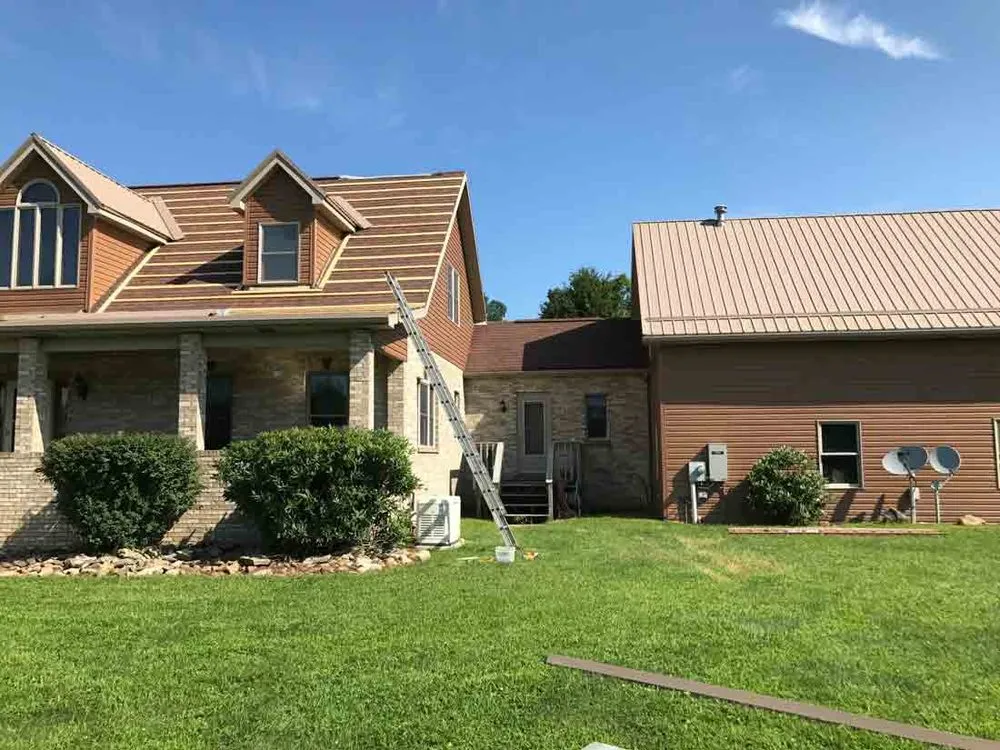 Licensed storm damage roof repair same-day service in Avonmore, PA by Armstrong Home Improvements