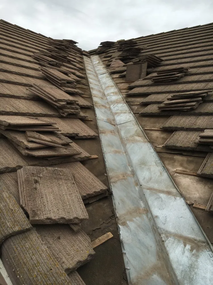 Slide of Armtrout's Custom Roofing