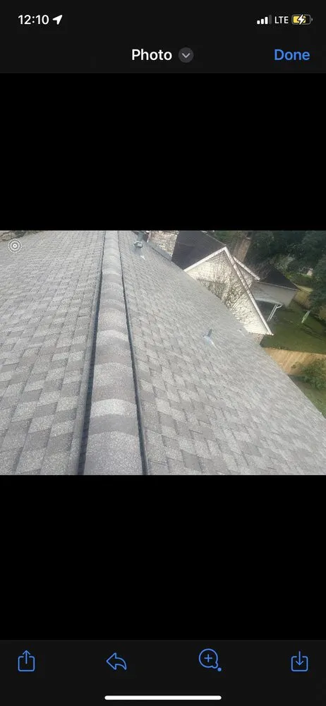 Slide of Arnold Roofing and Construction