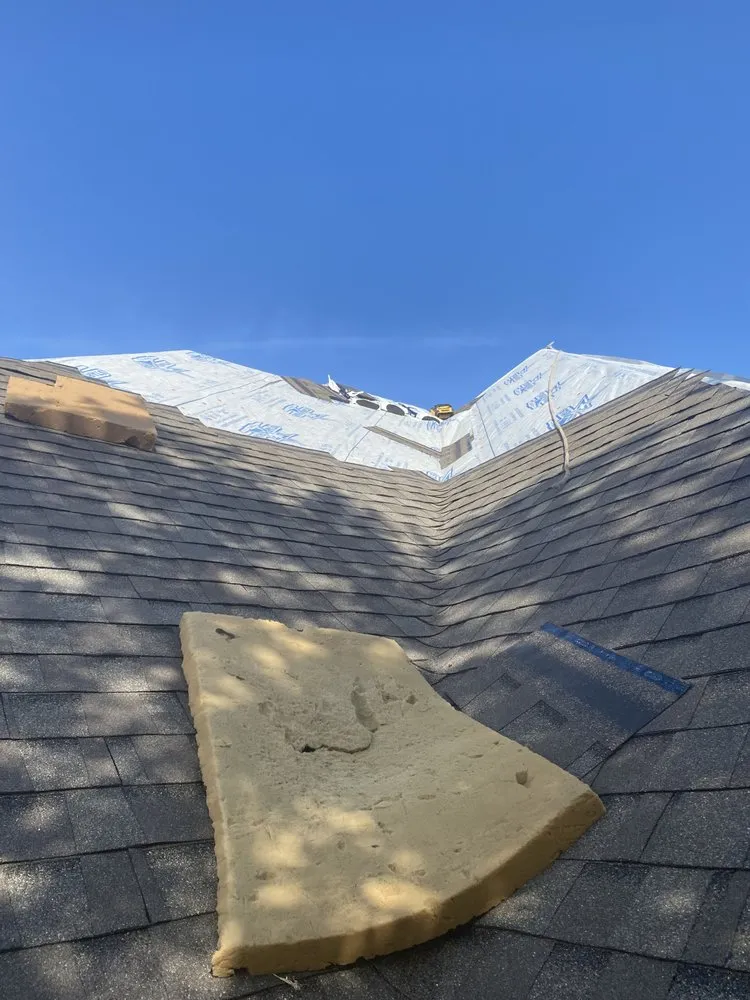 Slide of Arnold Roofing and Construction