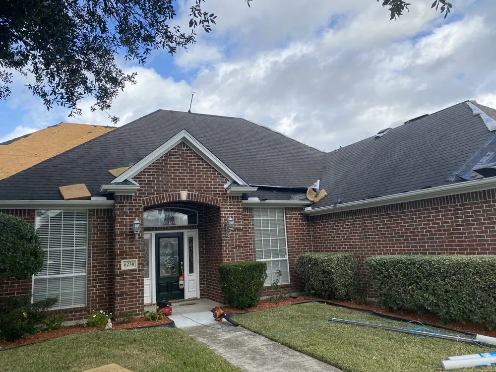 Slide of Arnold Roofing and Construction