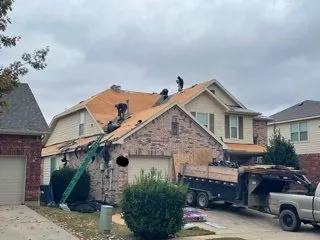 Slide of Arnold's Roofing