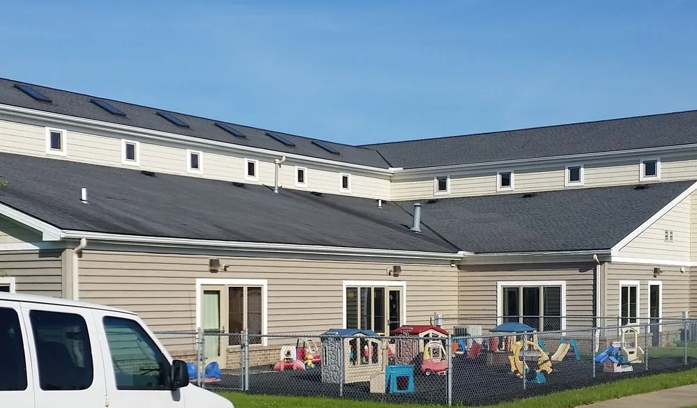 Slide of Arnold's Roofing Company