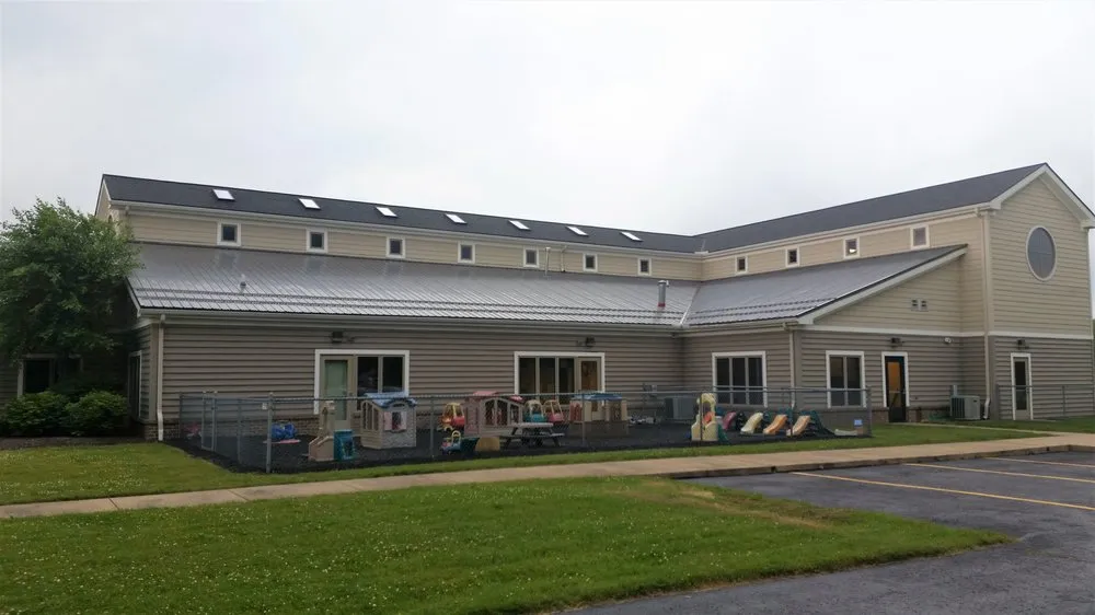 Slide of Arnold's Roofing Company