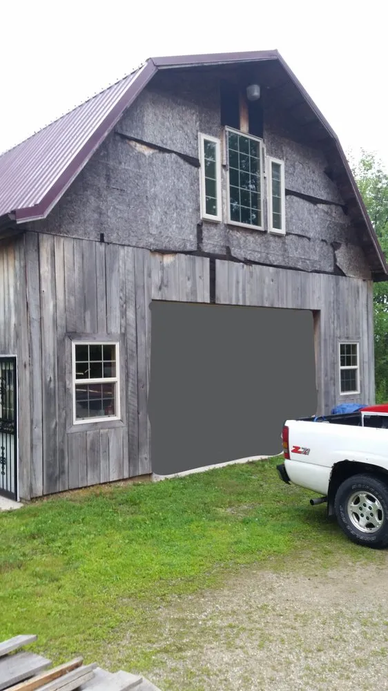 Slide of Arnold's Roofing Company