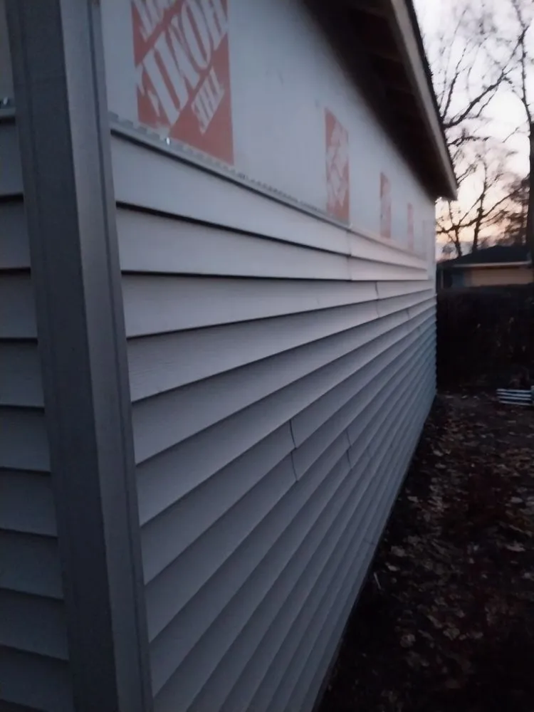 Slide of Arnst Roofing and Construction