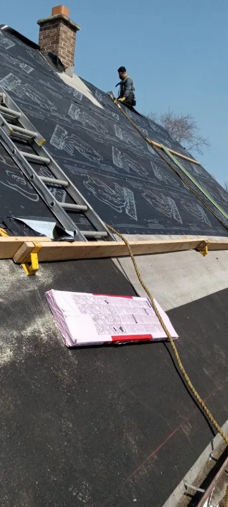 Slide of Arnst Roofing and Construction