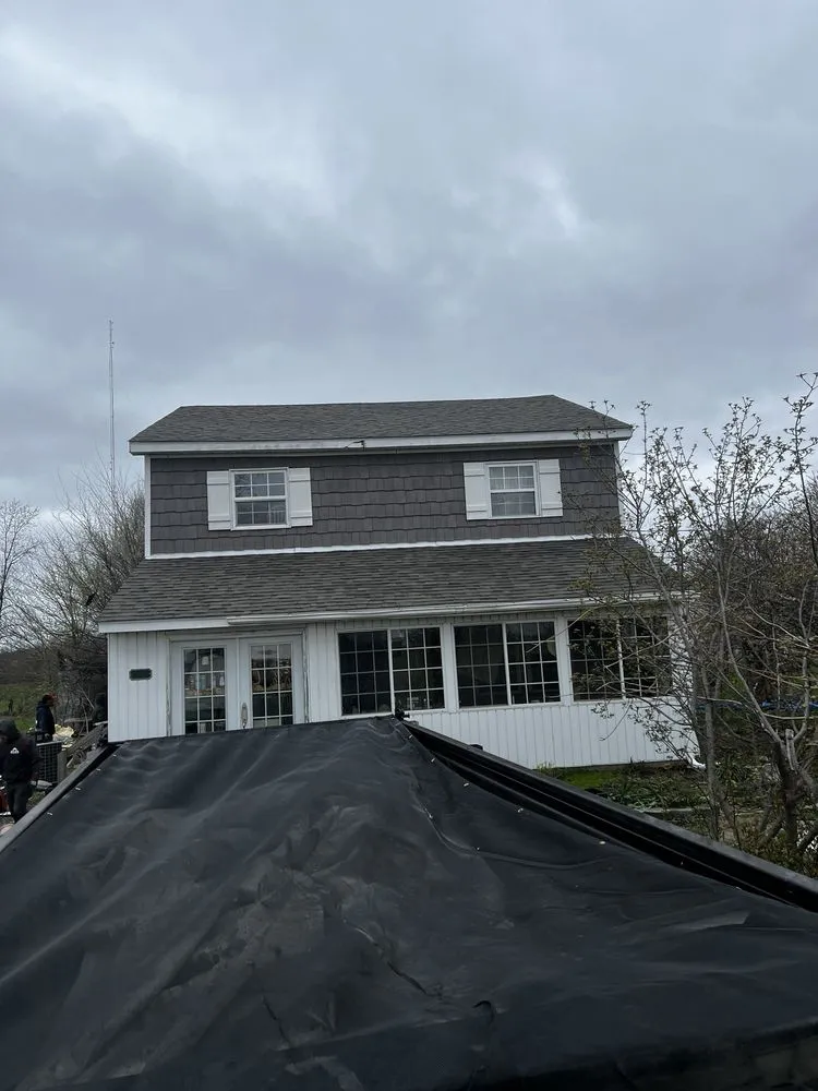 Slide of Arnst Roofing