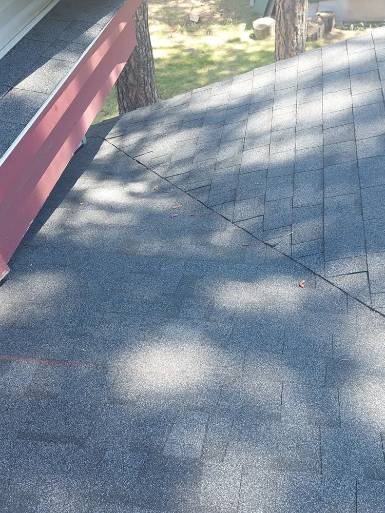 Slide of Arrow Point Roofing & Gutters