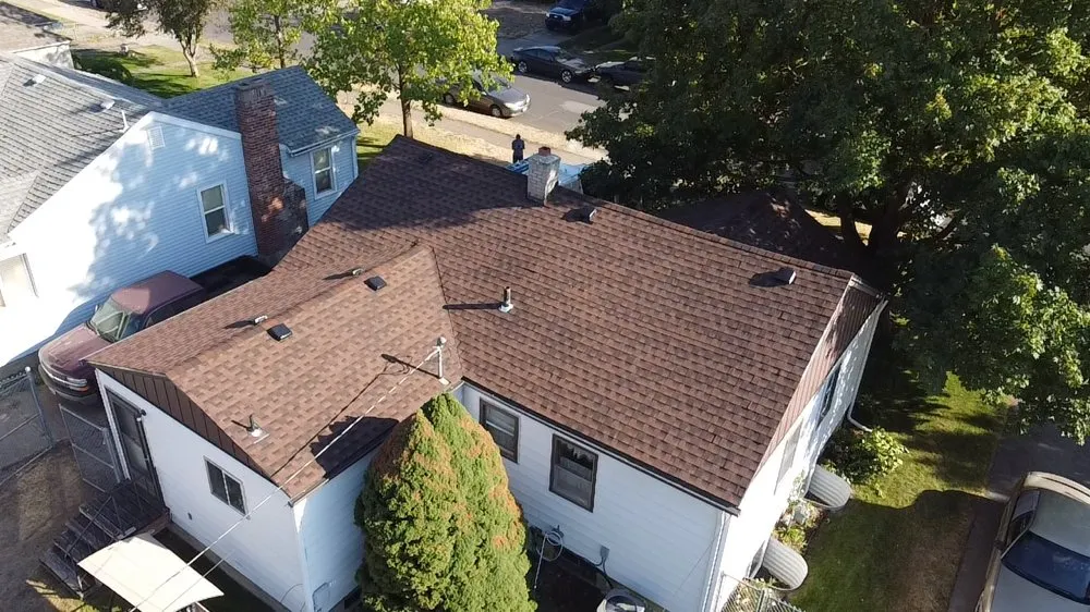 Slide of Arrow Point Roofing & Gutters