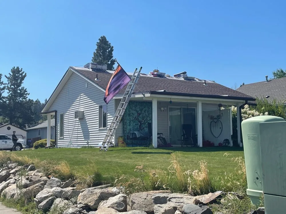 Slide of Arrow Point Roofing & Gutters