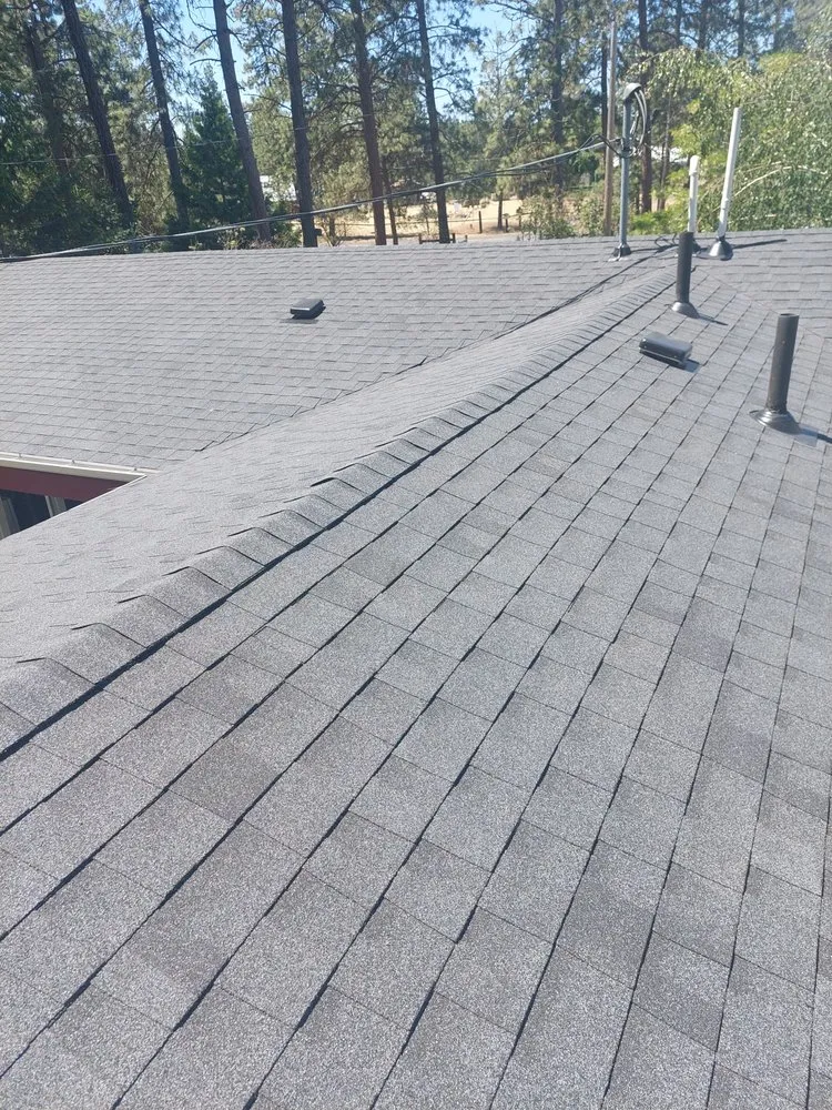 Slide of Arrow Point Roofing & Gutters