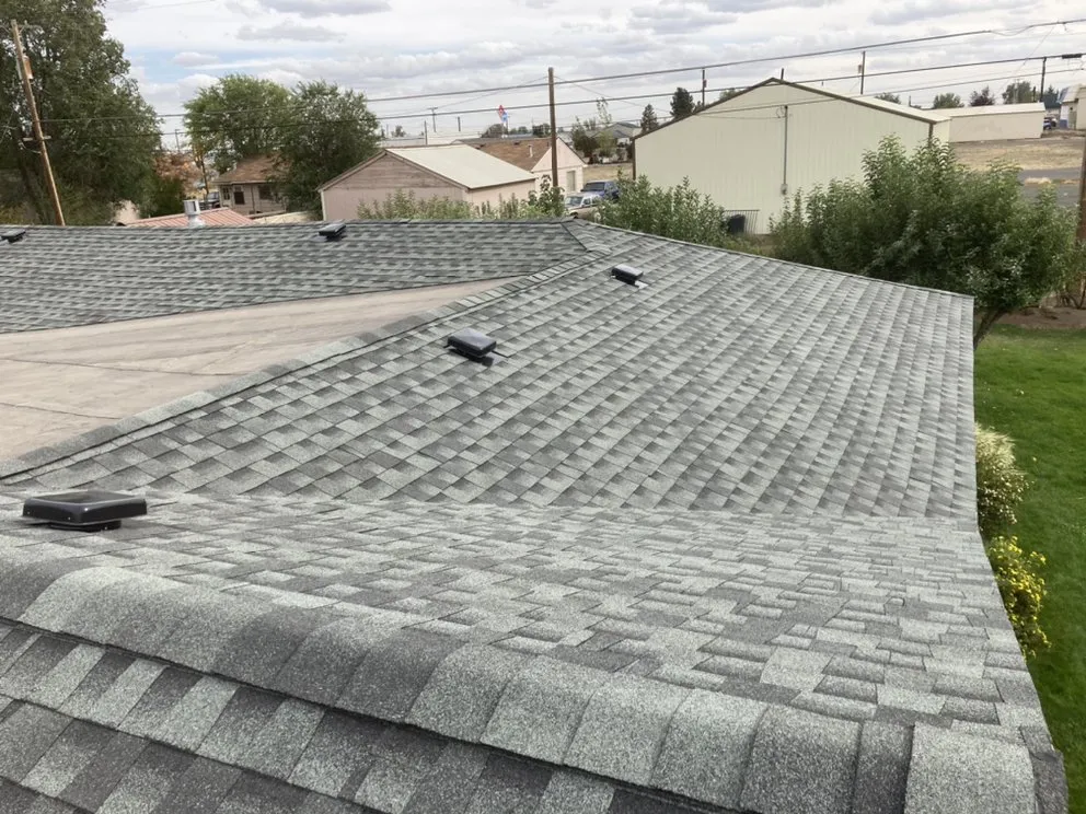 Slide of Arrow Point Roofing & Gutters