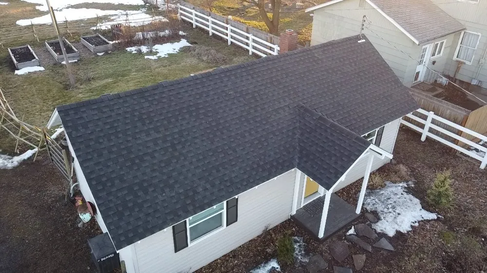 Slide of Arrow Point Roofing & Gutters