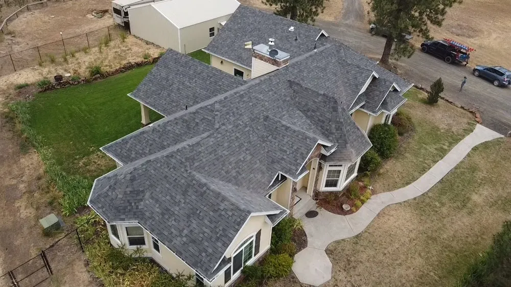 Slide of Arrow Point Roofing & Gutters