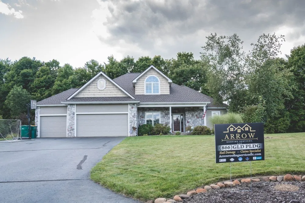 Slide of Arrow Roofing Services