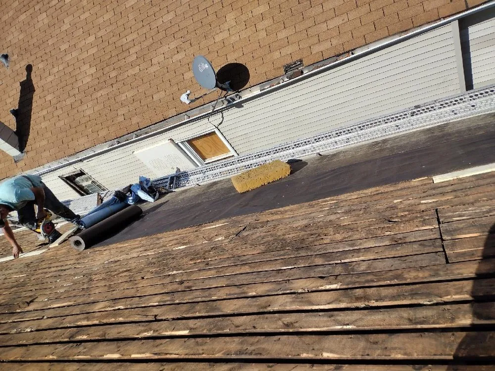 Slide of Arroyo's Roofing & Construction